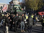 Farmers are arrested by police and led away in handcuffs as they defy Westminster tractor ban to protest over Rachel Reeves' budget